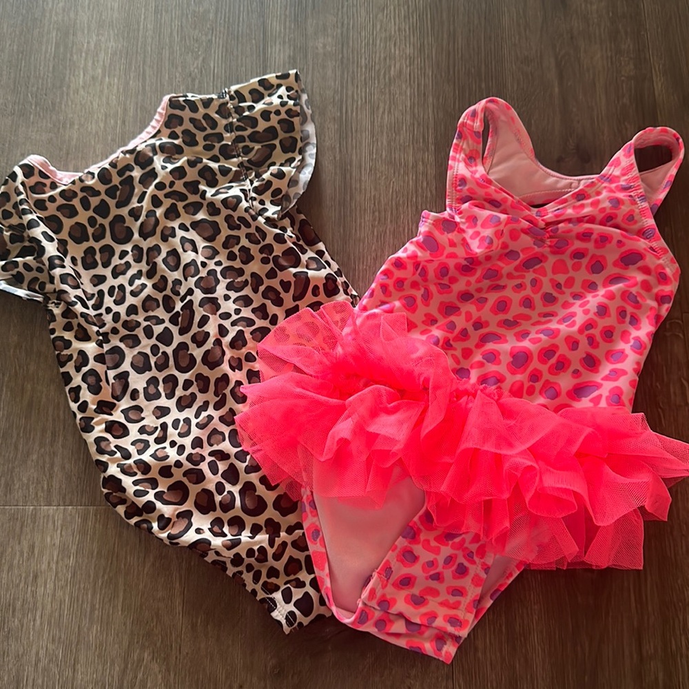 Two one piece bathing suits